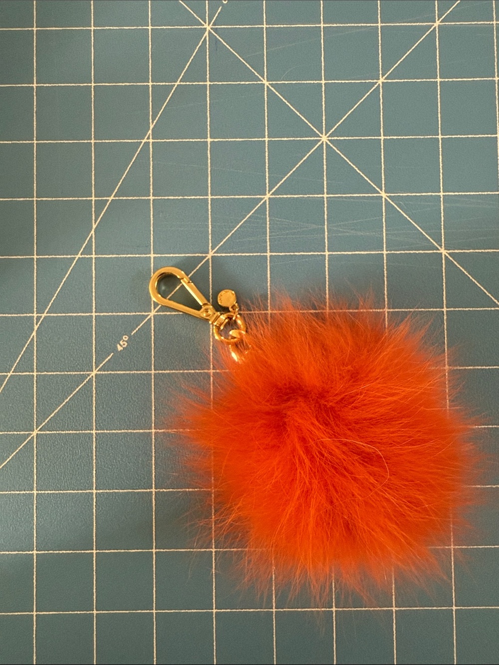 Michael Kors Orange Fur Pom Pom Bag Charm with Gold Hardware
